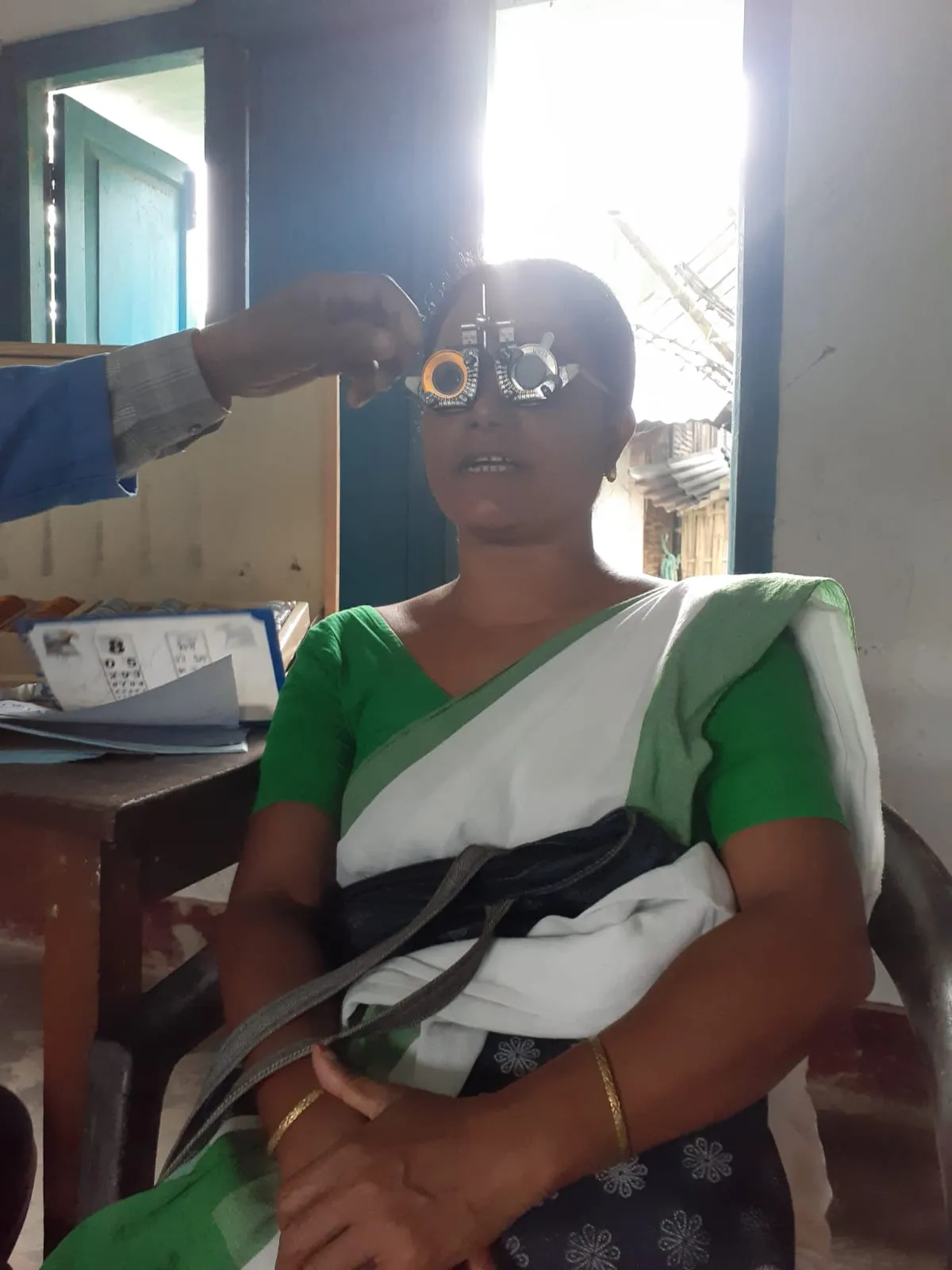 Local beneficiaries waiting for their diagnostic check-up and spectacles distribution at Digboi Bagjan.
